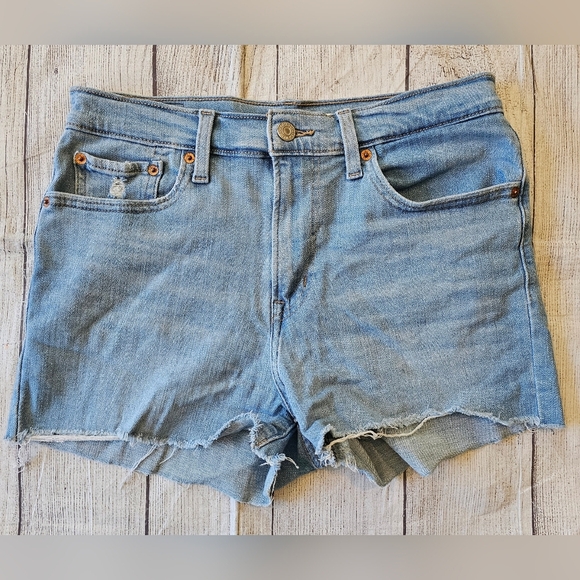 Levi's Women's Size 28 High Rise Shorts Denim Raw Hem Light Wash Summer Festival - Picture 1 of 9